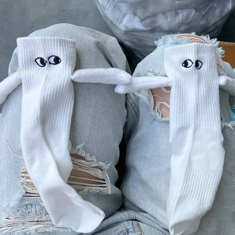 Hand Holding Socks